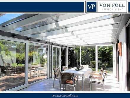 Grüne Wohnidylle - Moderne Wohnung mit Wintergarten und Gartenanteil
