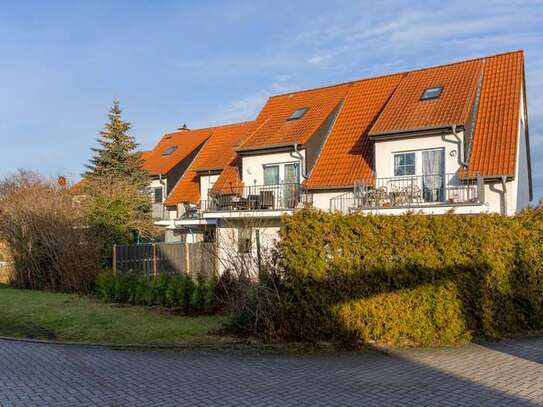 Charmante 2-Zimmer Maisonette-Wohnung mit Balkon und PKW Stellplatz.