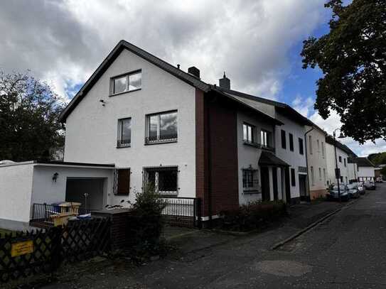 Familienfreundliches Haus mit Wintergarten, Balkon und Garten - renovierungsbedürftig mit Potential!