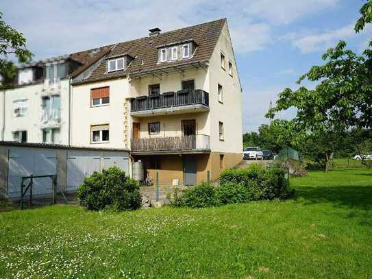 Vermietetes 3-Familienhaus mit 3 Garagen auf Erbpachtgrundstück in Leverkusen-Bürrig!