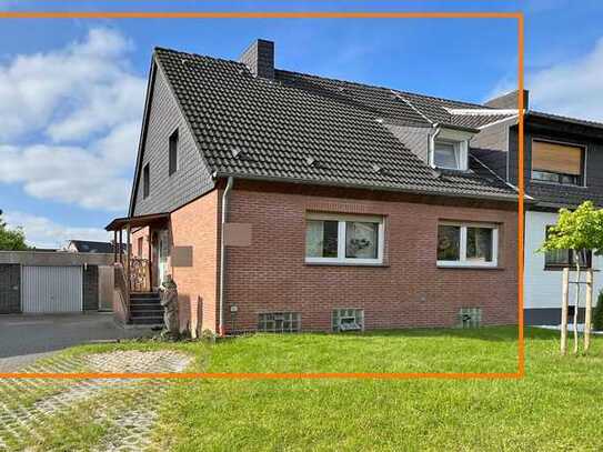 Viele Möglichkeiten: Traumhaftes Zweifamilienhaus in Voerde - Wohnen mit Stil und Potenzial!