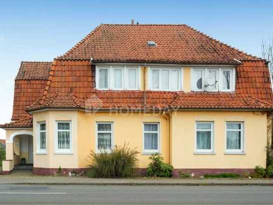 Exklusive Investitionschance: Zweifamilienhaus und Bauland in begehrter Lage