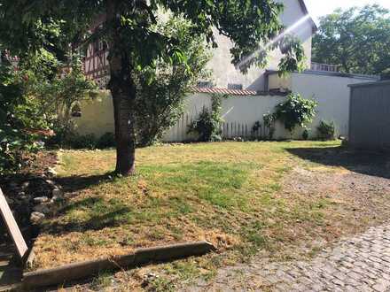 Zweifamilienhaus mit Gewerbeeinheit und Ausbaupotential sowie Baugrundstück in Worms-Herrnsheim