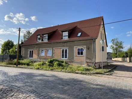 Großes Ausbaupotenzial in Glauzig! 
2-Familienhaus mit Garten und Garage