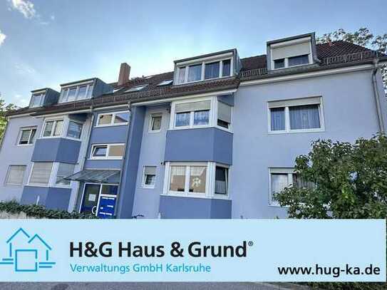 Gepflegtes Mehrfamilienhaus mit 7 WE, Balkonen, Terrasse + Garagen in Wolfartsweier