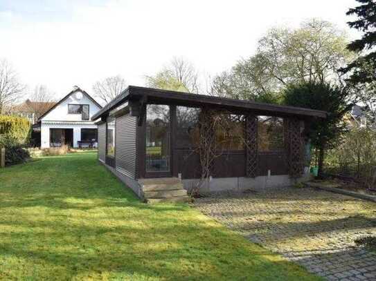 Im grünen Bergstedt: Einfamilienhaus auf Süd-Grundstück, inkl. Pool und Sauna