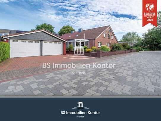 Uttum! Renovierte, gepflegte Doppelhaushälfte mit Garage, Gartenanlage und Wintergarten!