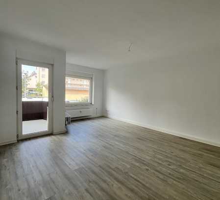 Stilvoll sanierte 3 Zimmer Wohnung mit Garten und Balkon