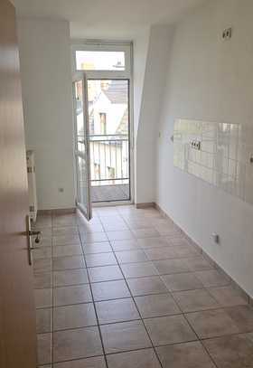 Dachgeschosswohnung mit Aufzug, Tageslichtbad und Balkon