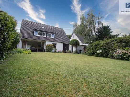 Freistehendes Ein-/Zweifamilienhaus in Köln-Junkersdorf mit Garage, Stellplätzen und großem Garten