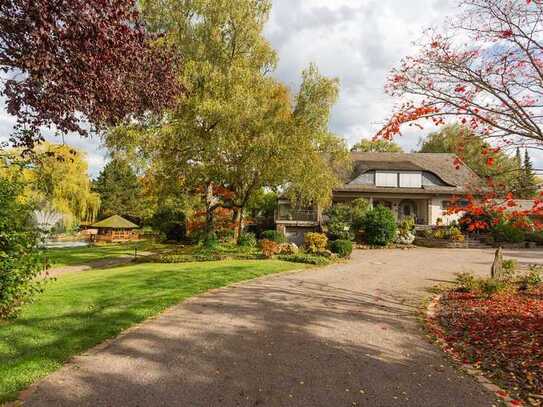 Anwesen mit parkähnlichem Garten, Wohn- und Geschäftsräumen, großem Wellnessbereich im Hunsrück.