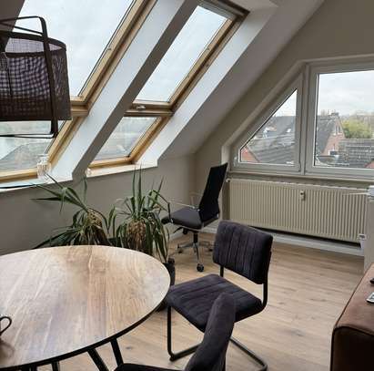 Gemütliche 2-Zimmer Dachgeschosswohnung mit Rheinblick