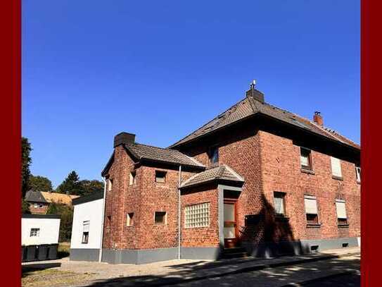 Doppelhaushälfte mit zwei Wohneinheiten und großem Garten in Übach-Palenberg, Stadtteil Marienberg