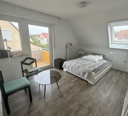 Moderne Einzimmerwohnung in Toplage mit Balkon und Gartenanteil