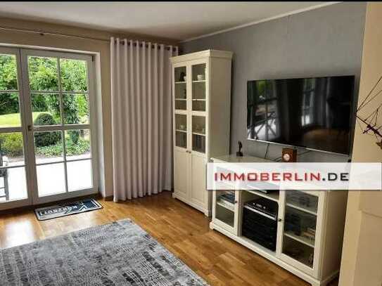 IMMOBERLIN.DE - Toplage! Feine Erdgeschosswohnung mit Südterrasse & -garten, Kamin & Pkw-Stellplatz