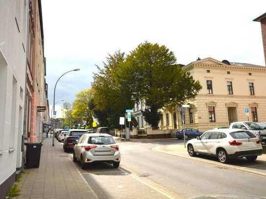 Vollvermietetes 4-Familienhaus mit Werkstatt in Top City-Lage