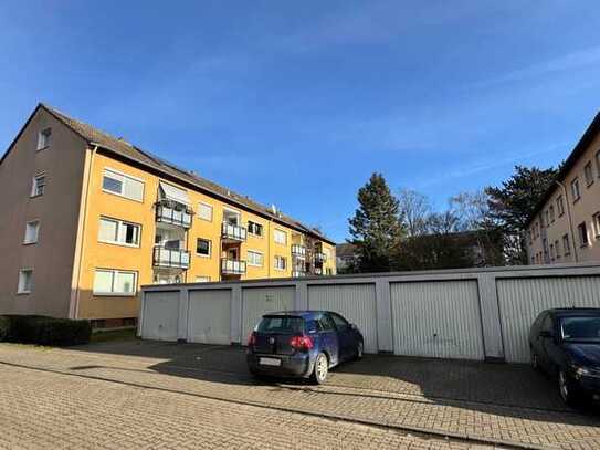 4-Zimmer-Erdgeschosswohnung mit Balkon und Garage – renovierungsbedürftig!