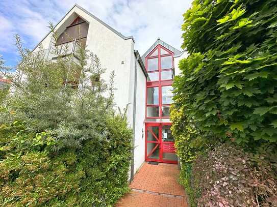 Wärmegedämmte Wohnung mit Balkonen und Carport