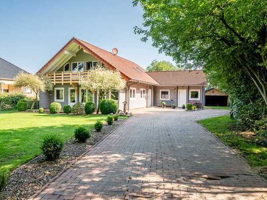 Wohnen wie im Urlaub - Familienfreundliches Massivholzhaus in idyllischer Lage