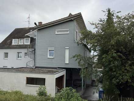 Haus mit 3 Wohnungen und 1 Gewerbe, Zentrumsnah