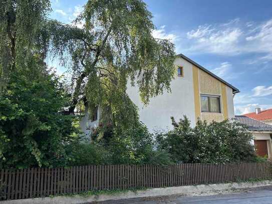 Sonniges Baugrundstück mit Altbestand in bester Lage von Alt-Poing