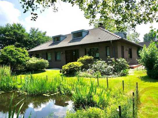 Charmantes Einfamilienhaus mit großem Grundstück – Ihr Refugium im Grünen!