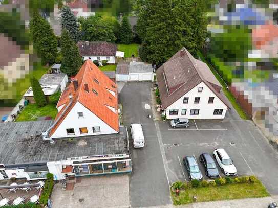 Attraktive Investitionsmöglichkeit: Zwei Mehrfamilienhäuser und ein Einfamilienhaus in Langen