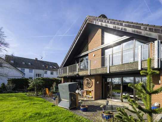 Feldrandlage Harenberg: Besonderes Einfamilienhaus mit Einliegerwohnung
