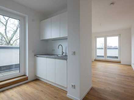 Erstbezug! Perfekt geschnittene 2-Zimmer-Wohnung mit eigener Ankleide, Einbauküche und 2 Balkonen