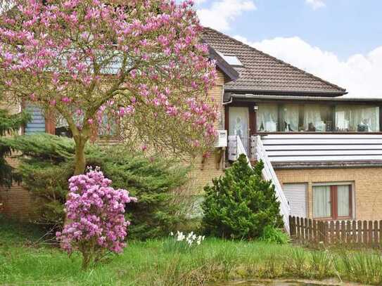 **Sonnige Aussichten** 
Ruhiges Einfamilienhaus mit Einliegerwohnung