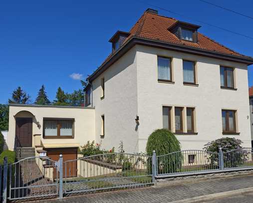 Einfamilienhaus mit Kamin auf großem Grundstück in bevorzugter Wohnlage!