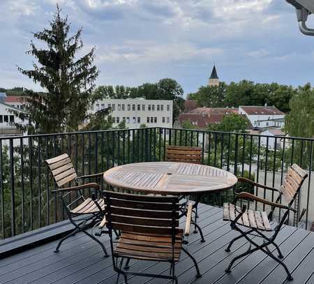 Hochwertige Dachgeschosswohnung mit Südbalkon und großer Glasfront