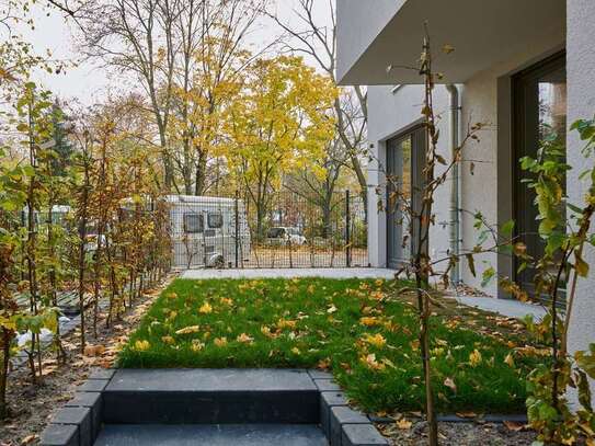 Erstbezug! Schöne 3-Zi.-Whg. mit hochwertiger Einbauküche, Terrasse & kleinem Garten