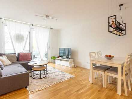 UPTOWN green living: Sonnige 2-Zimmer-Wohnung mit Südwest-Balkon, Parkett und TG in Top-Lage