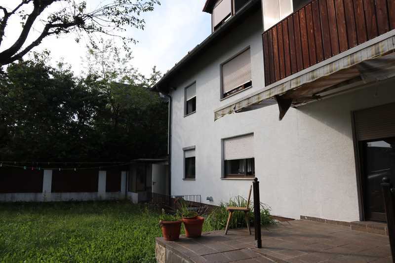 3 Wohnungen in ruhig gelegenem Mehrfamilienhaus in Obermenzing plus Garage mit Geräteraum