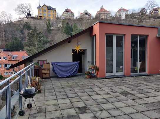 traumhafte 2-Zimmerwohnung mit großer Dachterrasse & Kamin!