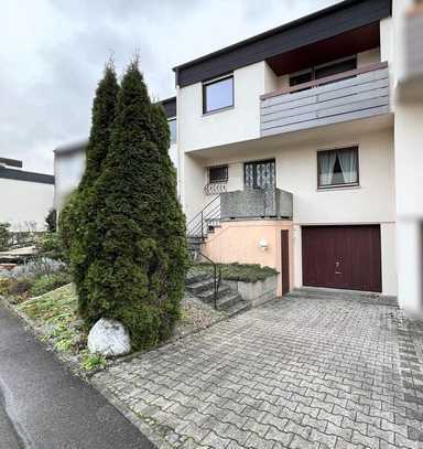 Gepflegtes Reihenmittelhaus mit Gartenbereich und Garage