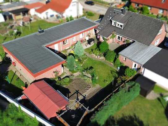 Einfamilienhaus mit möglicher Einliegerwohnung, Büro und Bungalow in ruhiger Wohngegend offenbart e