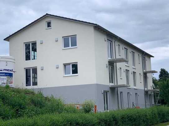 Neubau 1-Zimmer-Appartment mit Balkon und KfZ-Stellplatz