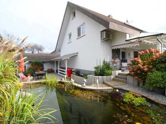 Herrliches Wohnhaus mit ausgebautem Dach, Kamin, Schwimmteich und vielen Extras in Willstätt