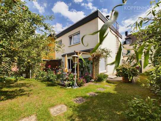 Einfamilienhaus mit gepflegten Garten auf gemeinsamem Grundstück