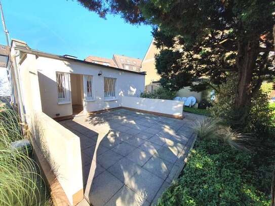 Bungalow mit großer Terrasse einschließlich Nebenräumen, NSP.