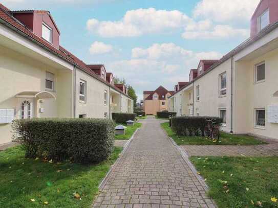 Vermietete 2-Zi.-DG-Whg. mit Balkon und TG-Stellplatz in See- und Golfplatznähe