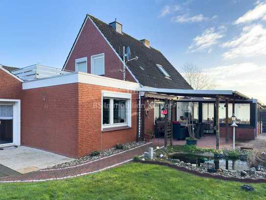 Gepfl. Einfamilienhaus mit Garage und Dachterrasse in bevorzugter Wohnlage von Bunde