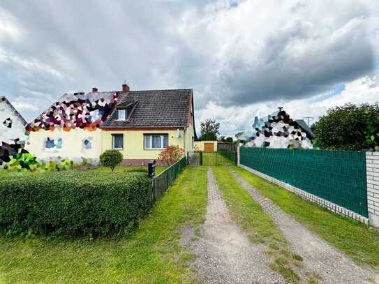 Schöne Doppelhaushälfte mit Garage und Garten