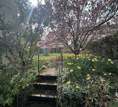 Tolle 3,5 Zi.-Wohnung mit Süwestterrasse, großer Garten EG-Feuerbach