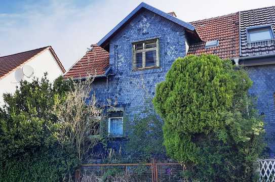 Sanierungsbedürftige Doppelhaushälfte mit Potenzial und großen Garten