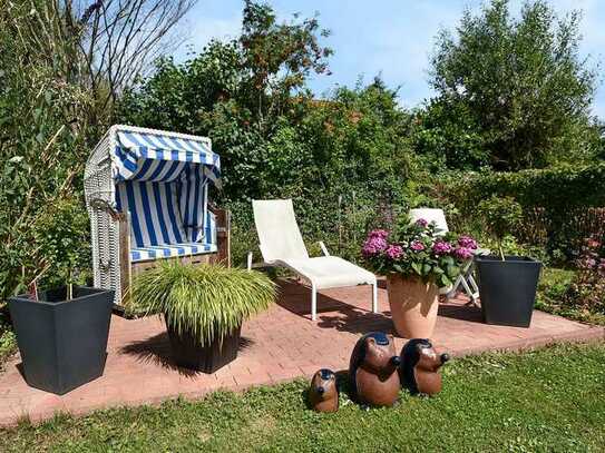 Wunderschöne Eigentumswohnung in idyllischer Lage mit eigenem Garten: Ihr Rückzugsort an der Ostsee!