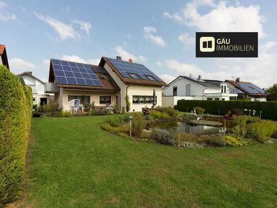 Exklusives Traumhaus mit großzügigem Raumkonzept, weitläufigem Garten und hochwertiger Ausstattung.