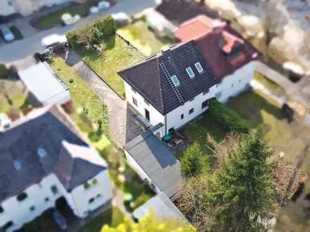 Sanierungsbedürftige DHH / ZFH mit viel Potenzial in zentraler und doch ruhiger Lage von Neubiberg